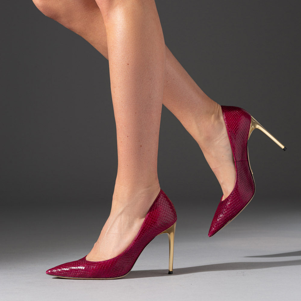 raspberry stiletto with reflective gold metal heel