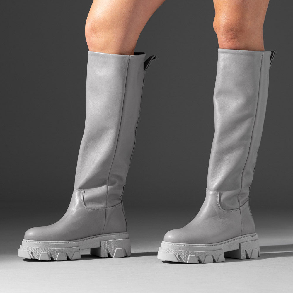 knee-high gray leather lugged sole boot