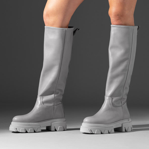 knee-high gray leather lugged sole boot